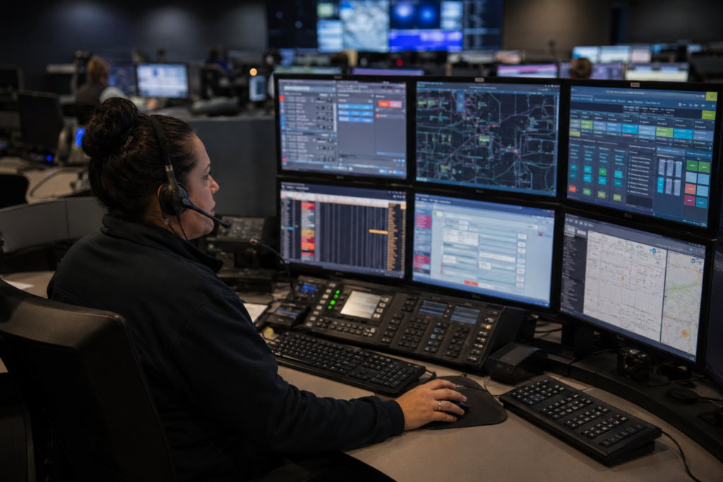 911 Dispatcher at Monitors